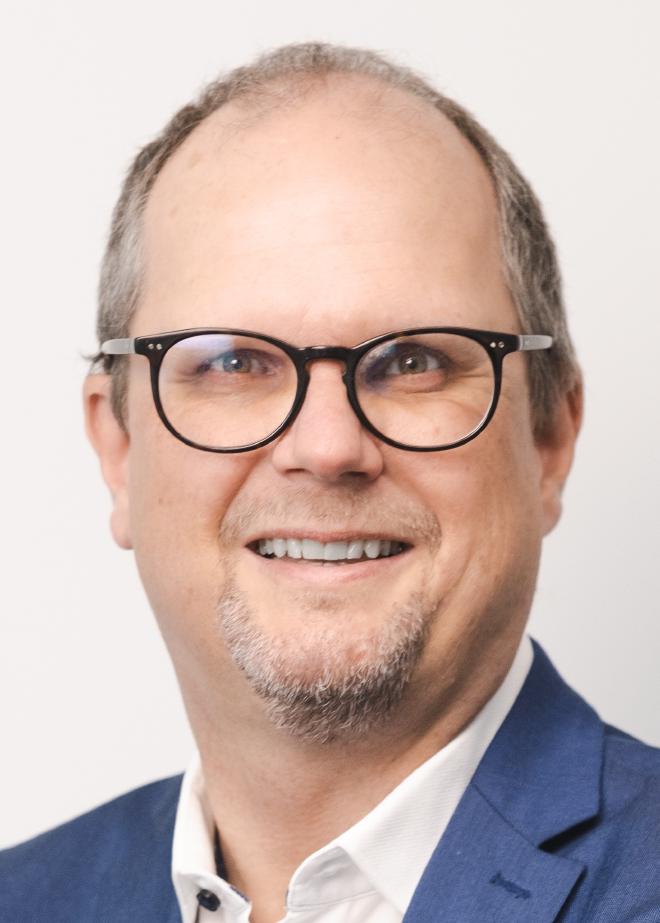 Oliver Tüscher